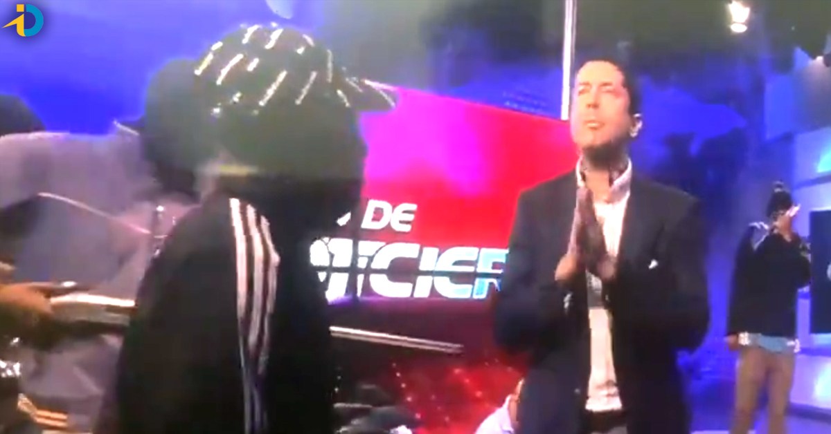 A gun was pointed at a news anchor live